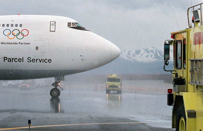 May 1999: Getting the traditional water treatment at Anchorage on my last flight. Photo: Mary Hayes